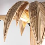 Illuminated “coconut tree” mirror in rattan