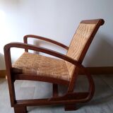 Pair of Art Deco woven rattan armchairs and table