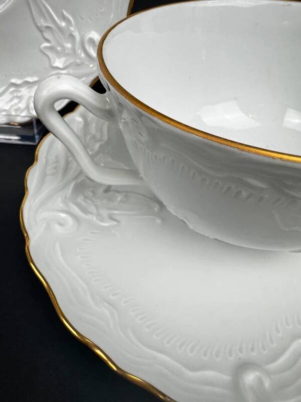 Tharaud Limoges white porcelain cups and saucers with gold relief