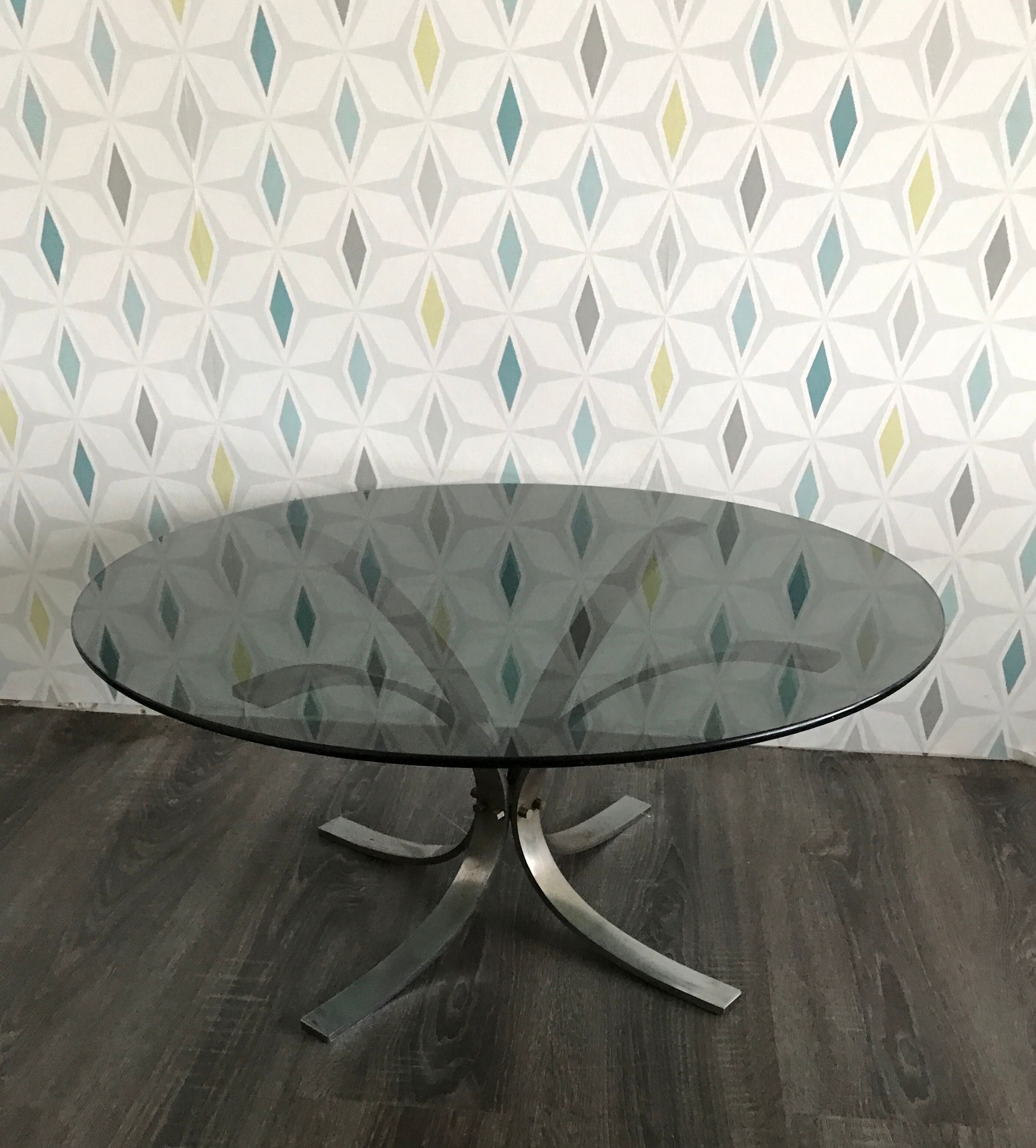 Vintage glass coffee table and chrome foot