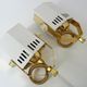 Pair of spot wall lamps adjustable design in white metal and brass. Year 80