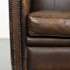 Characterful set of two sheepskin design armchairs with beautiful patina