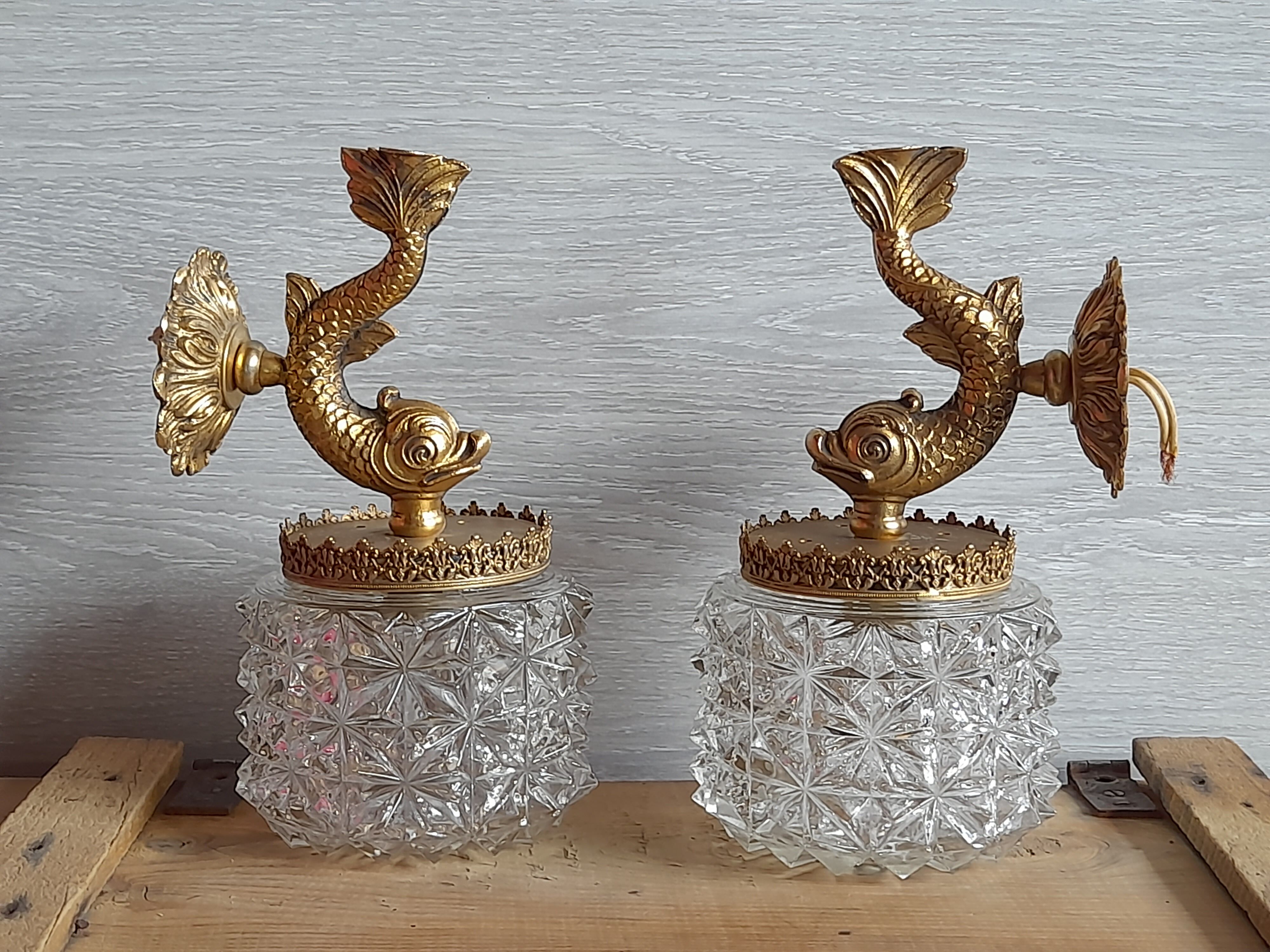 Pair of dolphin brass sconces