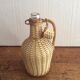 Vintage wicker bottle