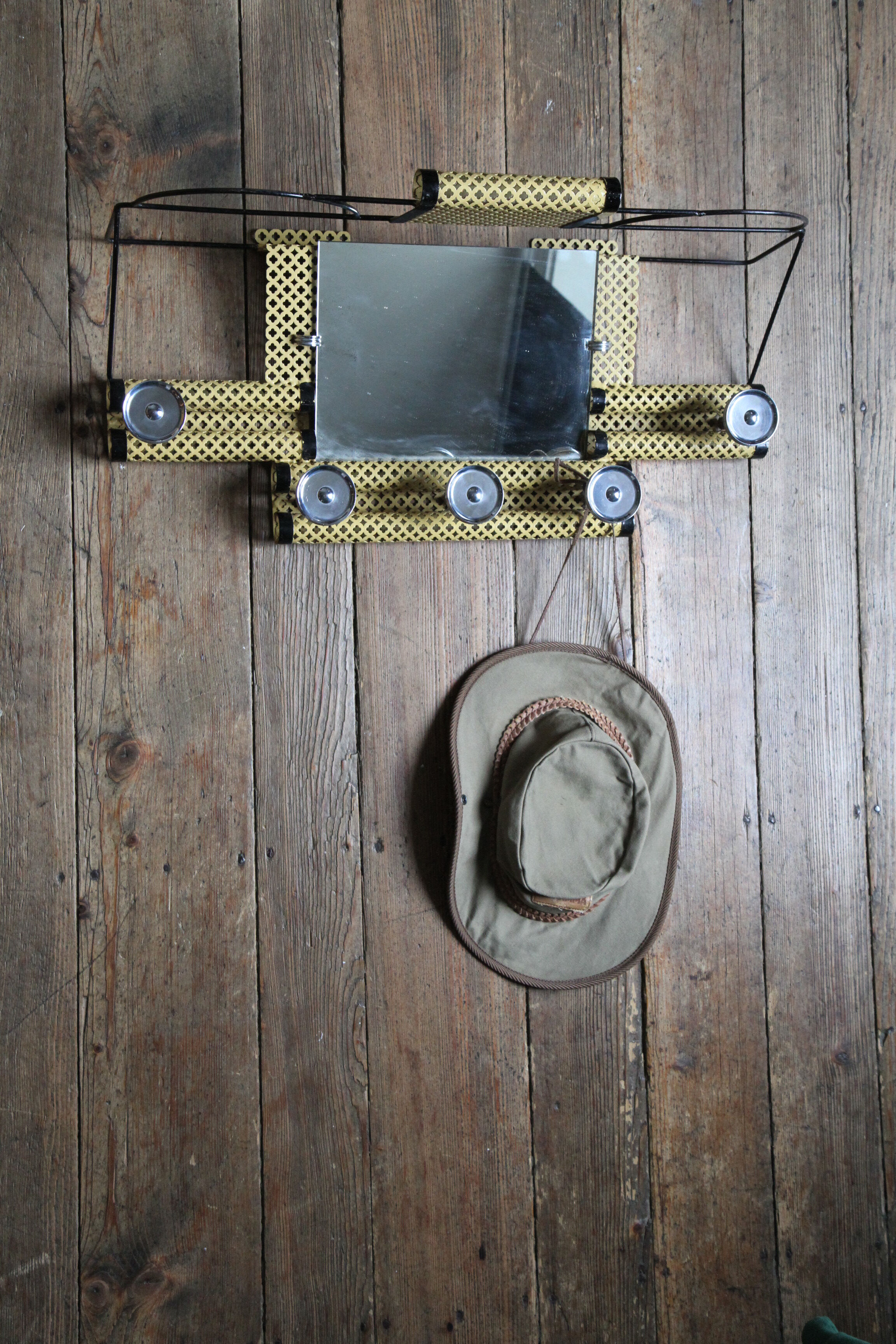 1950s perforated metal coat holder