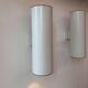 Pair of vintage cylindrical wall lights, matt white metal, Germany Erco 1976
