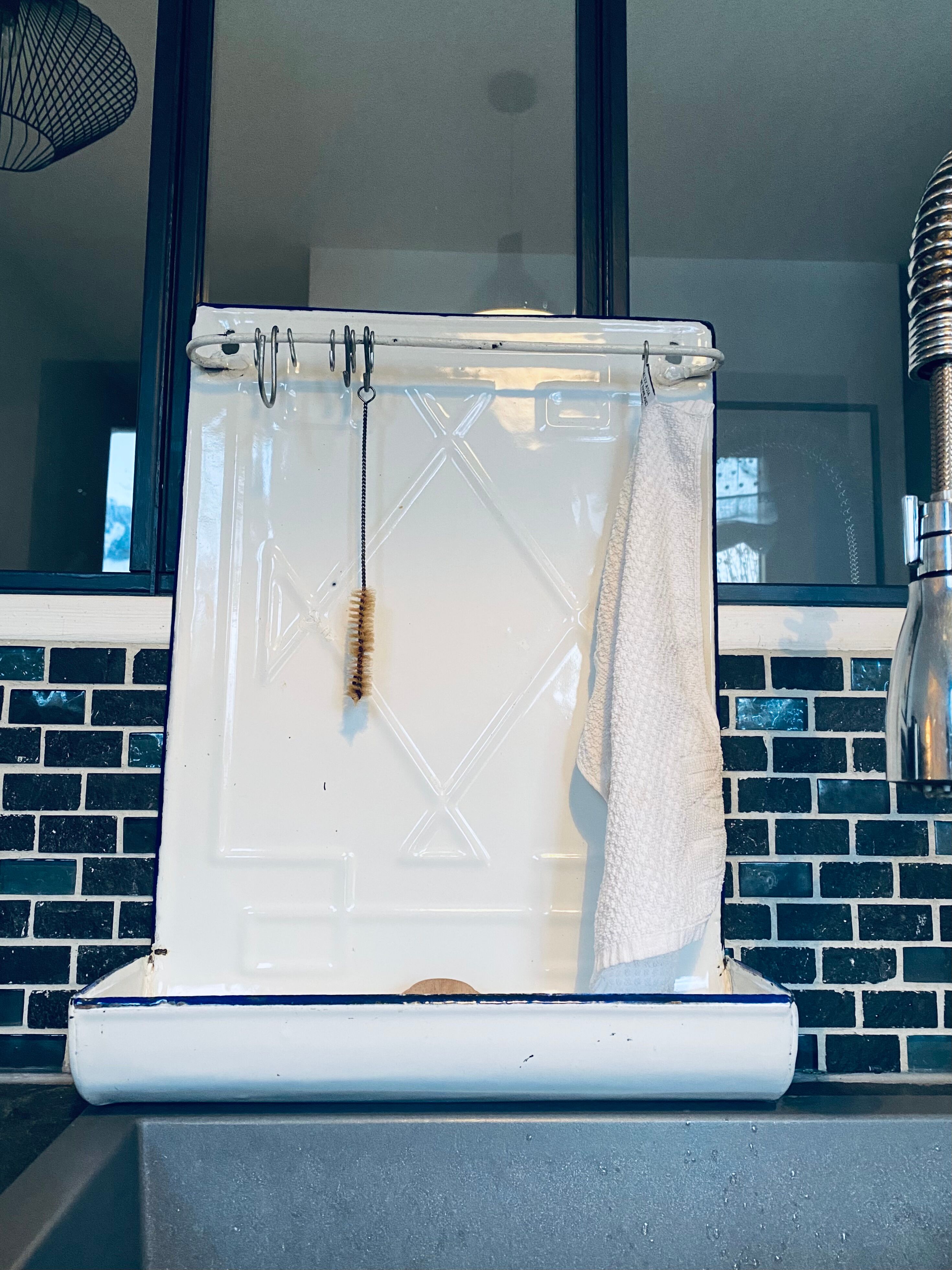 Old enamelled kitchen utensil display