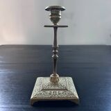 Chiseled brass candle holder