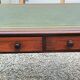 English desk with 2 drawers on green leather