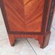 Louis XVI glass-fronted library in rosewood and amaranth veneer.