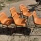 6 Grosfillex chairs from the 70s with orange shell.