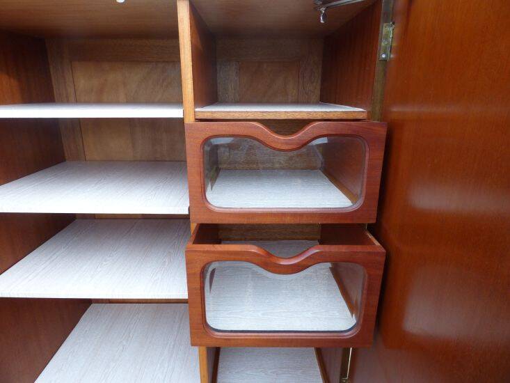 Wardrobe on a plinth in walnut and walnut veneer circa 1940.