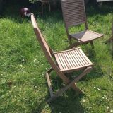 Four teak chairs