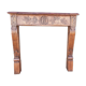 Manteau de cheminée en bois sculpté