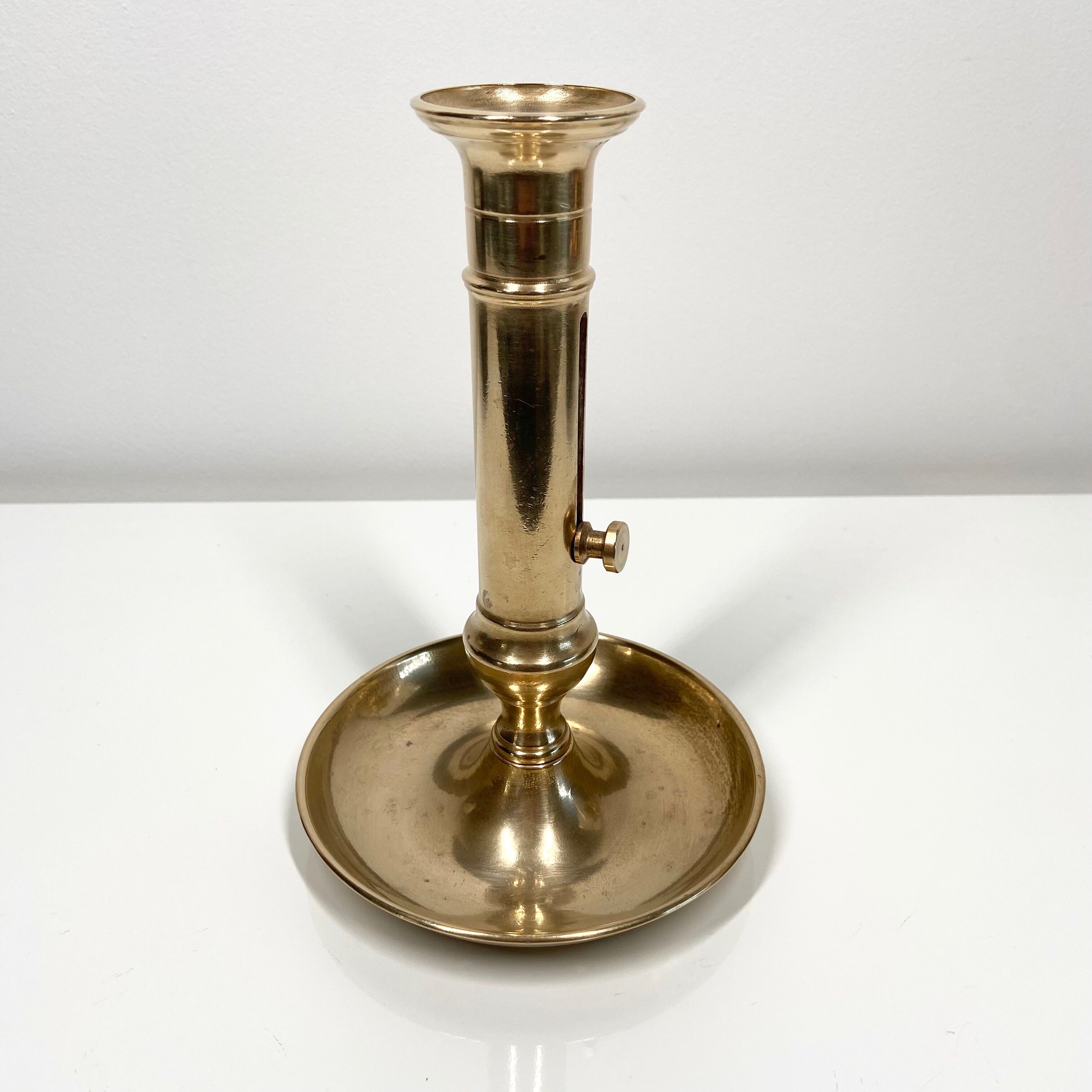 Pusher candle holder and solid brass