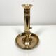 Pusher candle holder and solid brass
