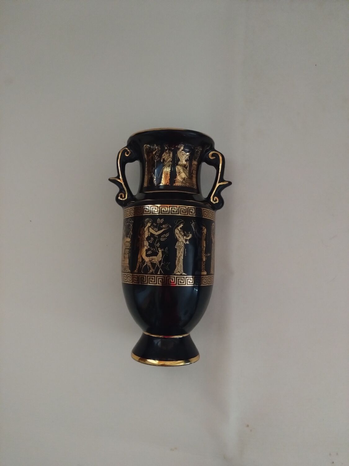 Petit vase noir et or