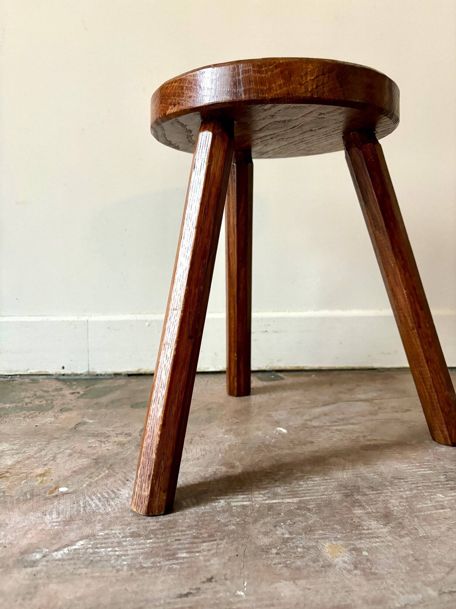Dark wood tripod stool