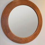 Round wall mirror made of solid wood