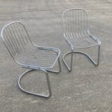 Two Gastone Rinaldi style chrome metal chairs.