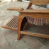 Teak stretchy long chair.