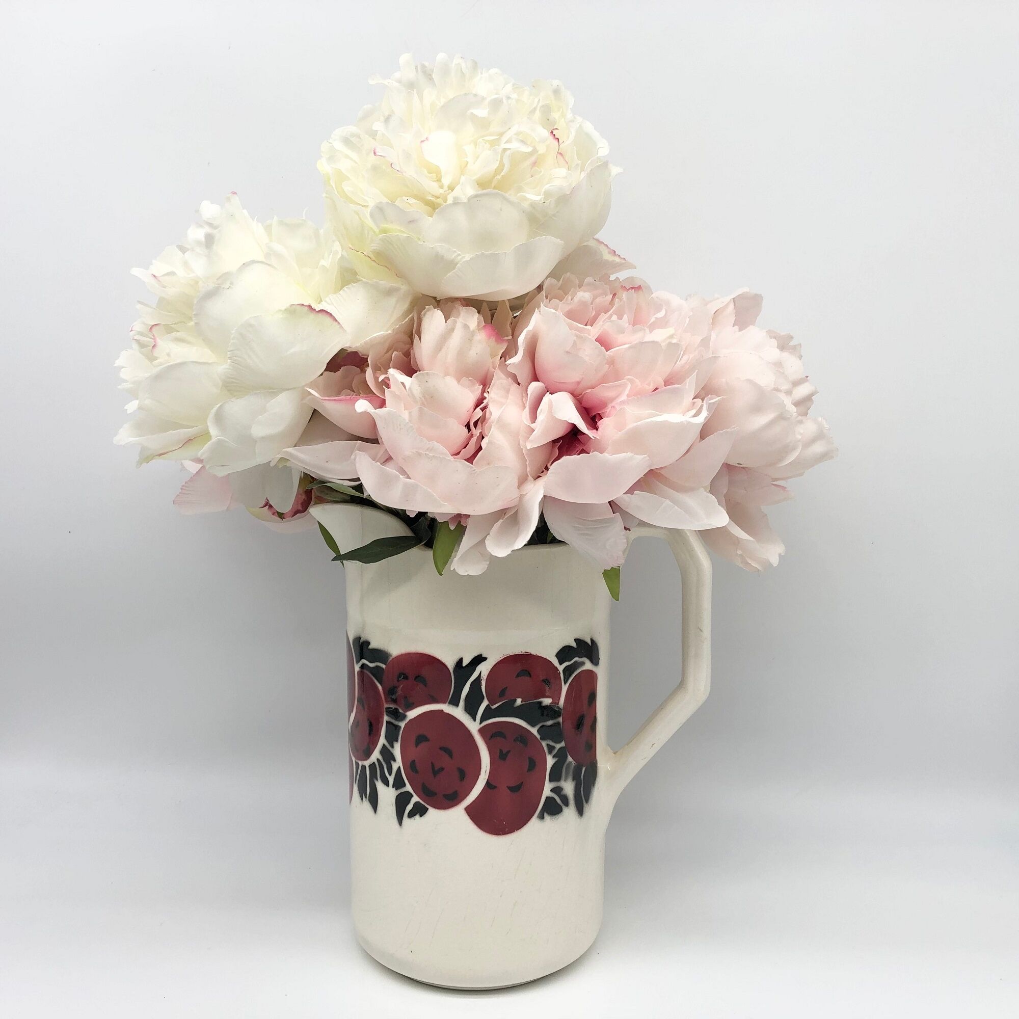 Old ceramic broc stamped "Mado"