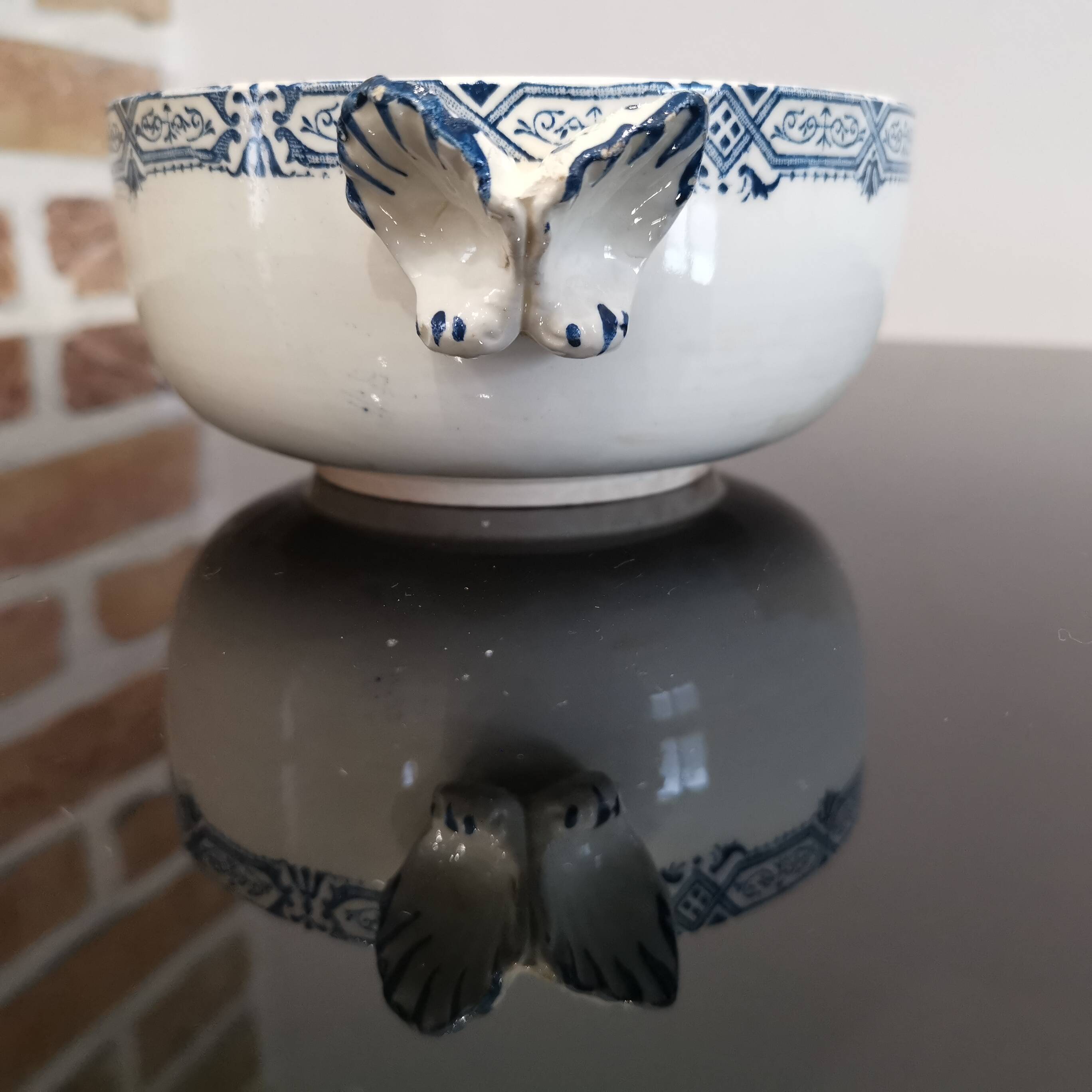 Butterfly ear bowl in iron clay with blue patterns