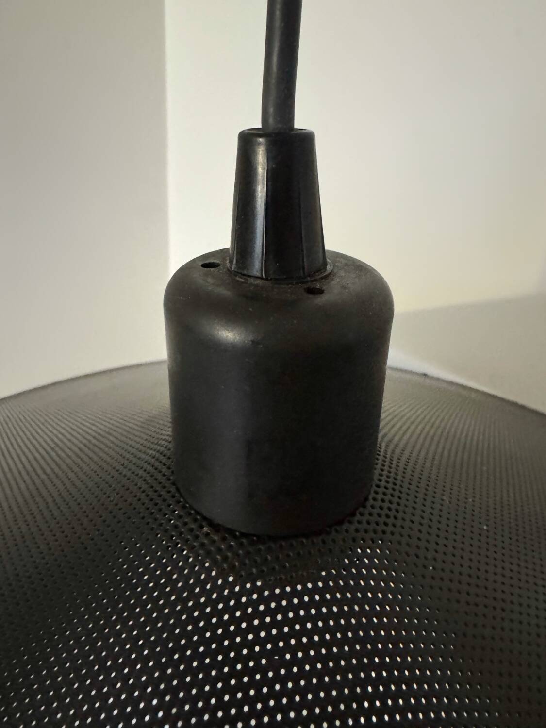 Metal micro-perforated suspension from the 1960s.