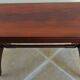 Restoration style coffee table in mahogany-colored wood / Very good condition