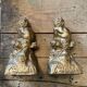 2 Seated satyr sculptures in cast bronze
