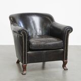Black cowhide leather armchair