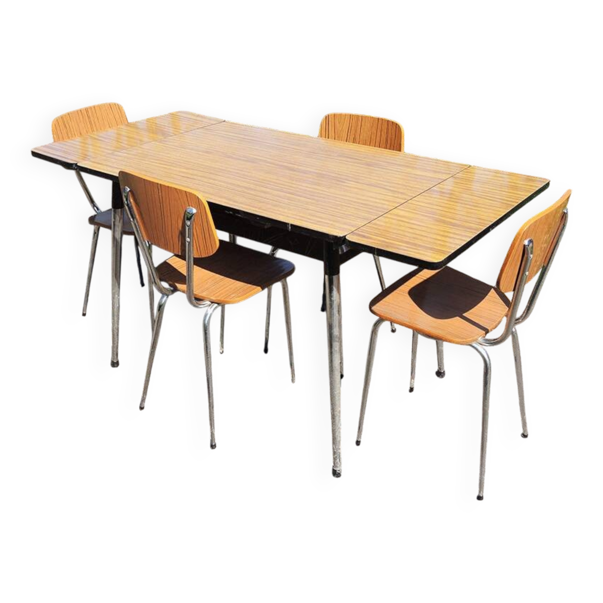 4 old chairs and an extendable table in 'faux wood' formica.