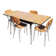 4 old chairs and an extendable table in 'faux wood' formica.