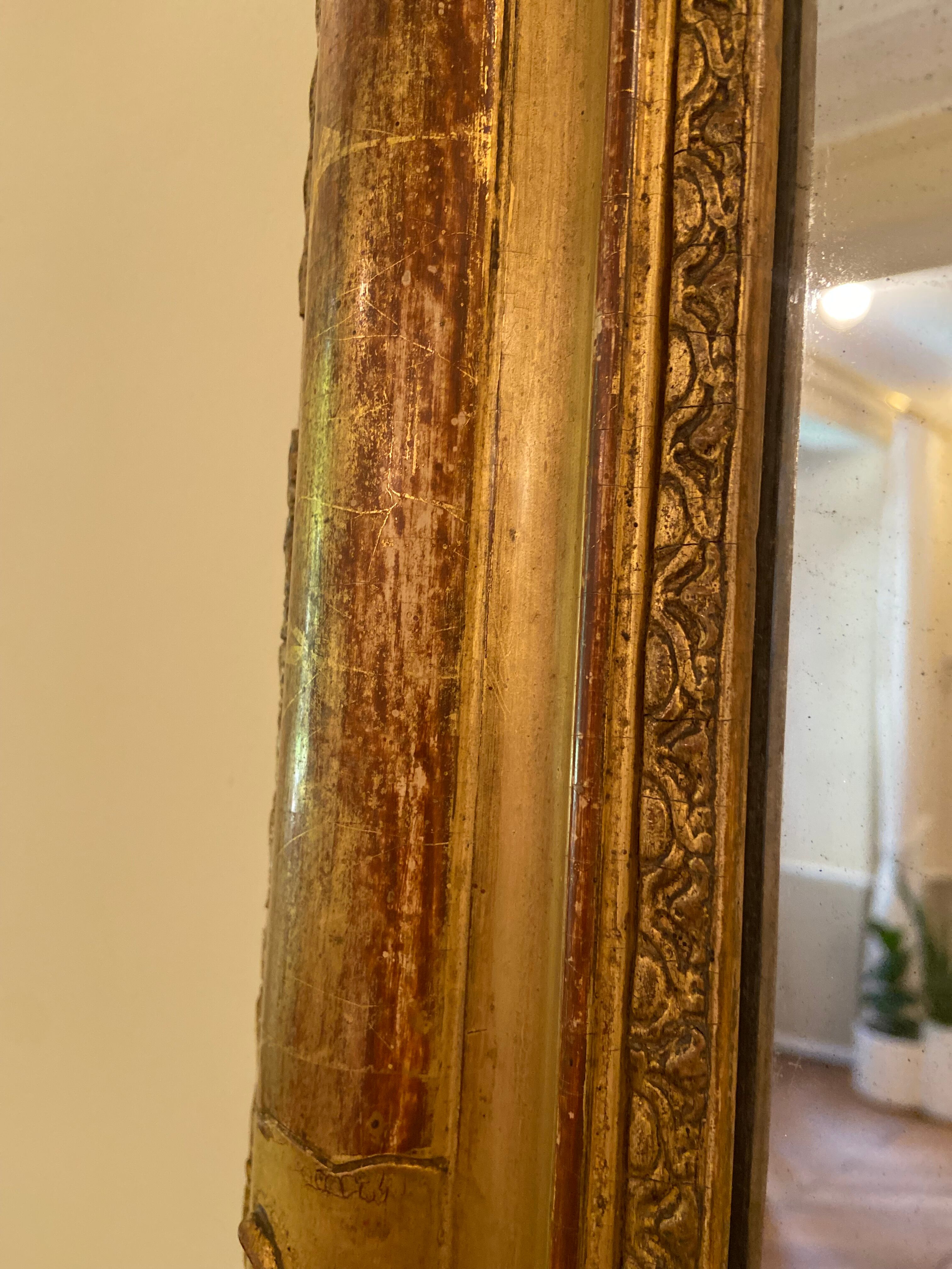 Old mercury mirror with pediment