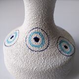 White and blue ceramic vase with italian relief