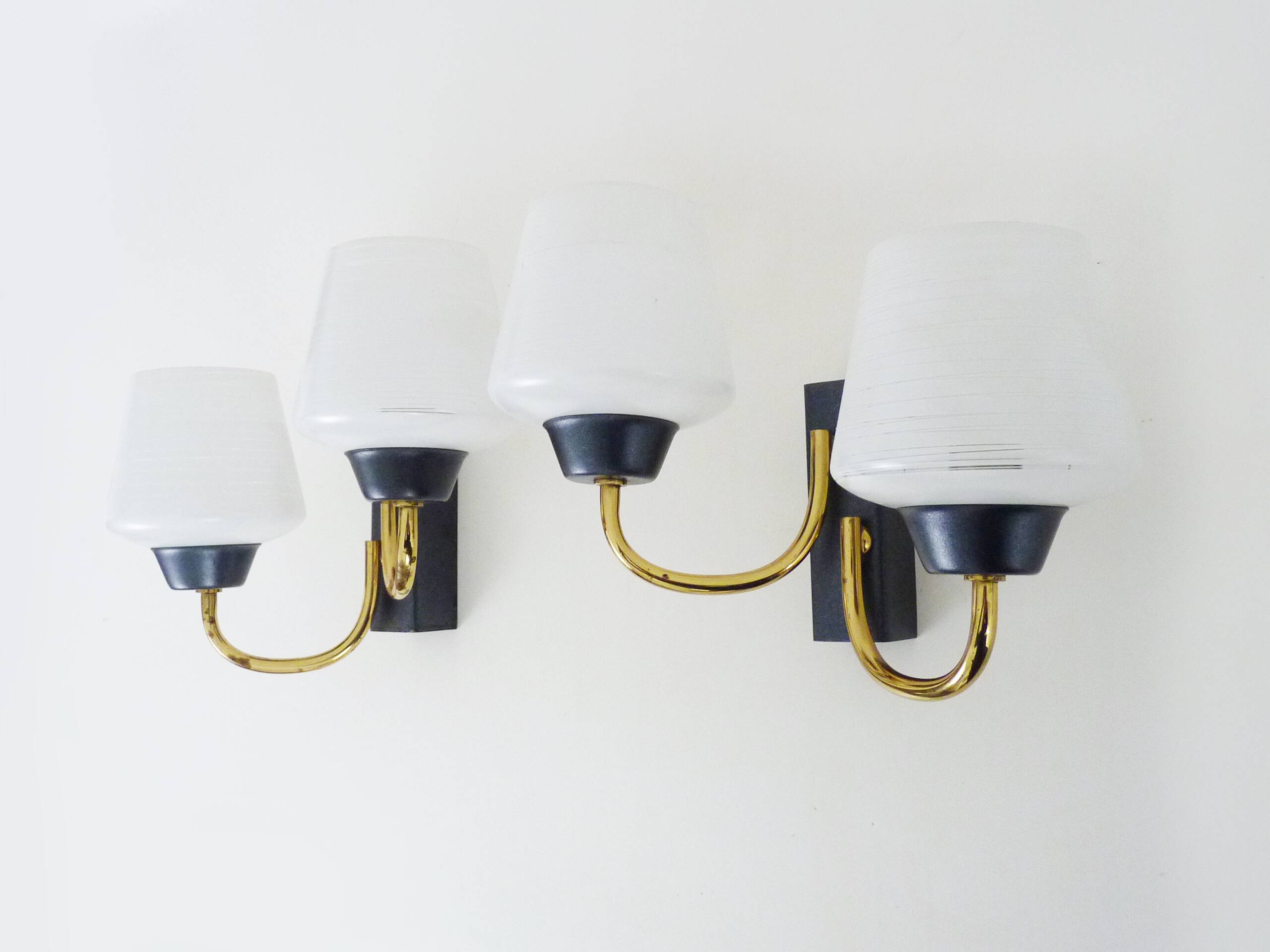 Pair of vintage Maison Arlus wall lights from the 1950s in brass, glass globe.