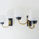 Pair of vintage Maison Arlus wall lights from the 1950s in brass, glass globe.