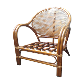 Low armchair in rattan and bamboo