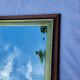 Large wooden and gold mirror