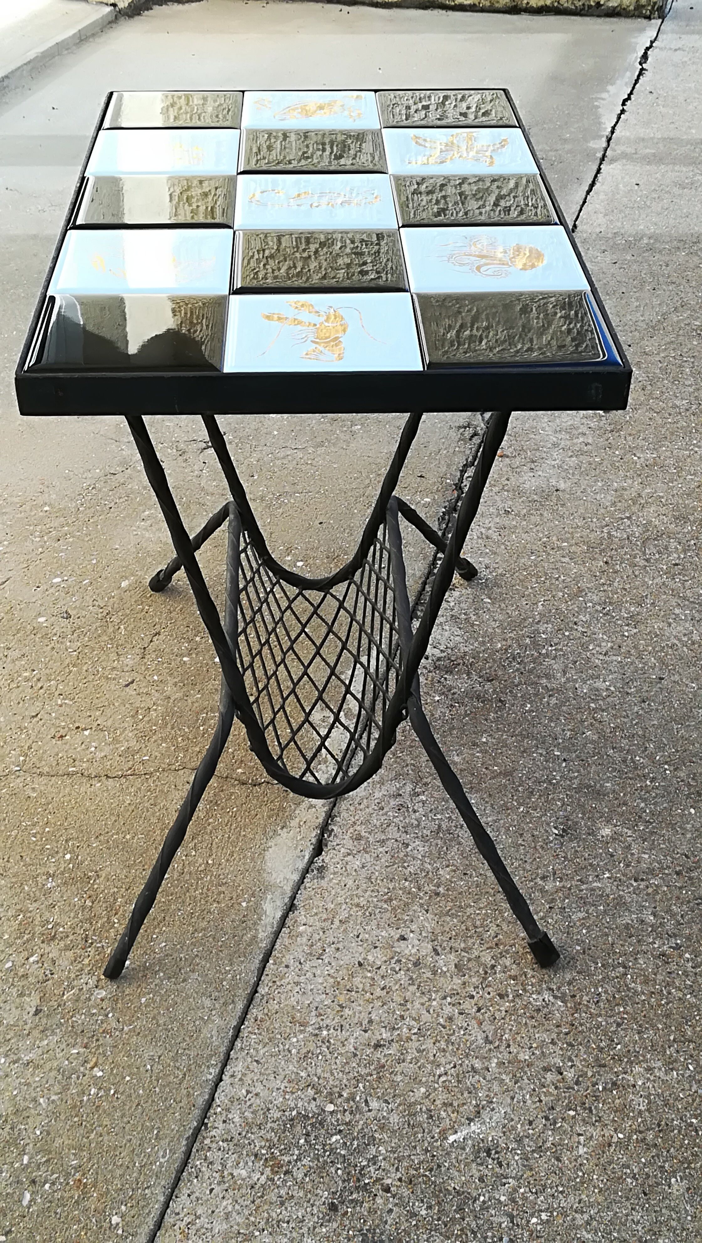 A side table at tiles in iron forge