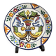 Decorative ceramic plate with griffins
