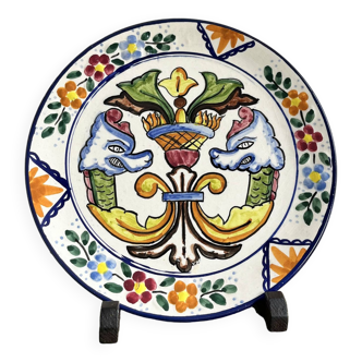 Decorative ceramic plate with griffins
