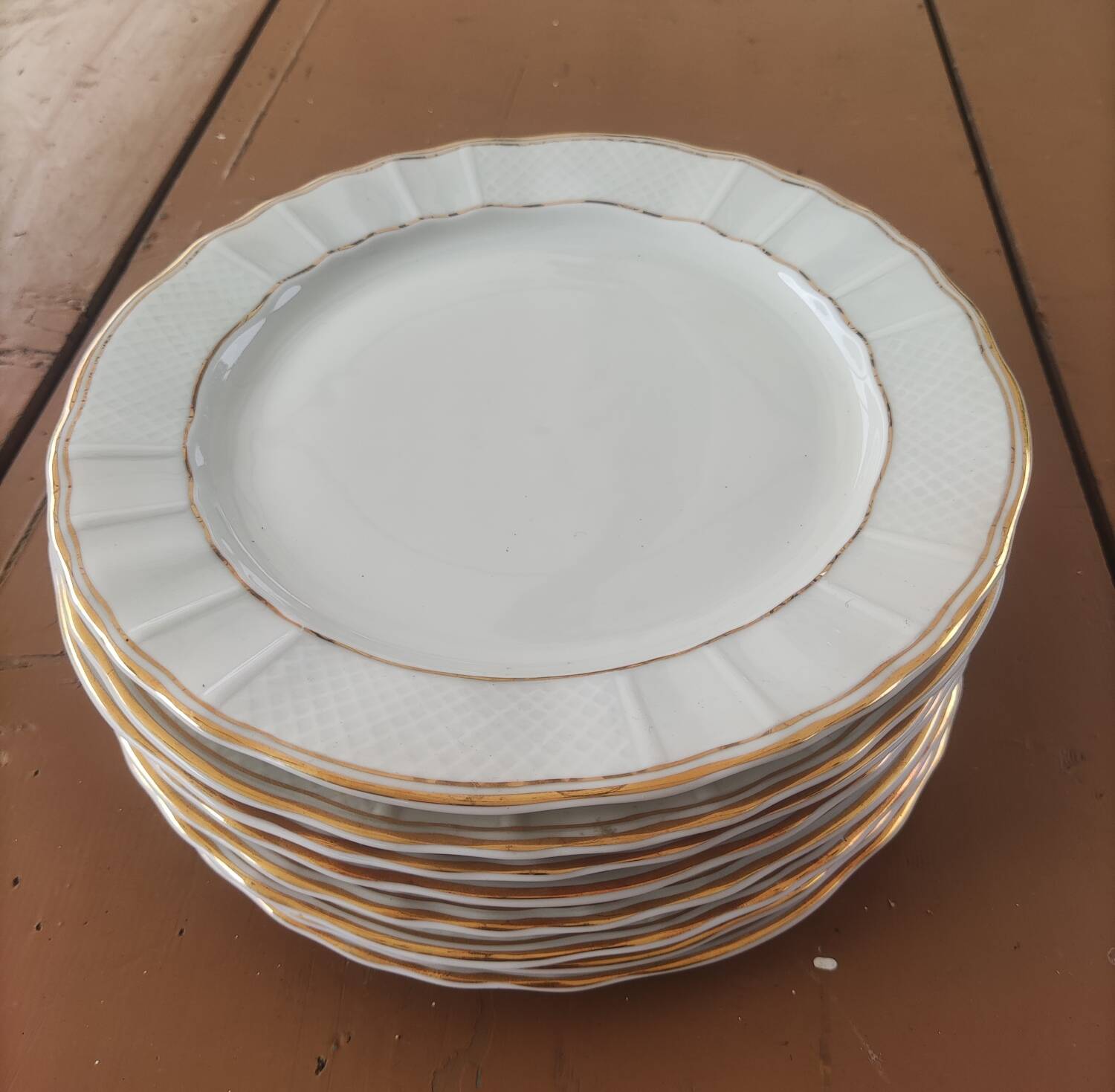 Ten Limoges porcelain plates B et Cie