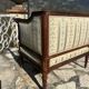 Low armchair in finely carved wood in the Louis XVI style from the 19th century