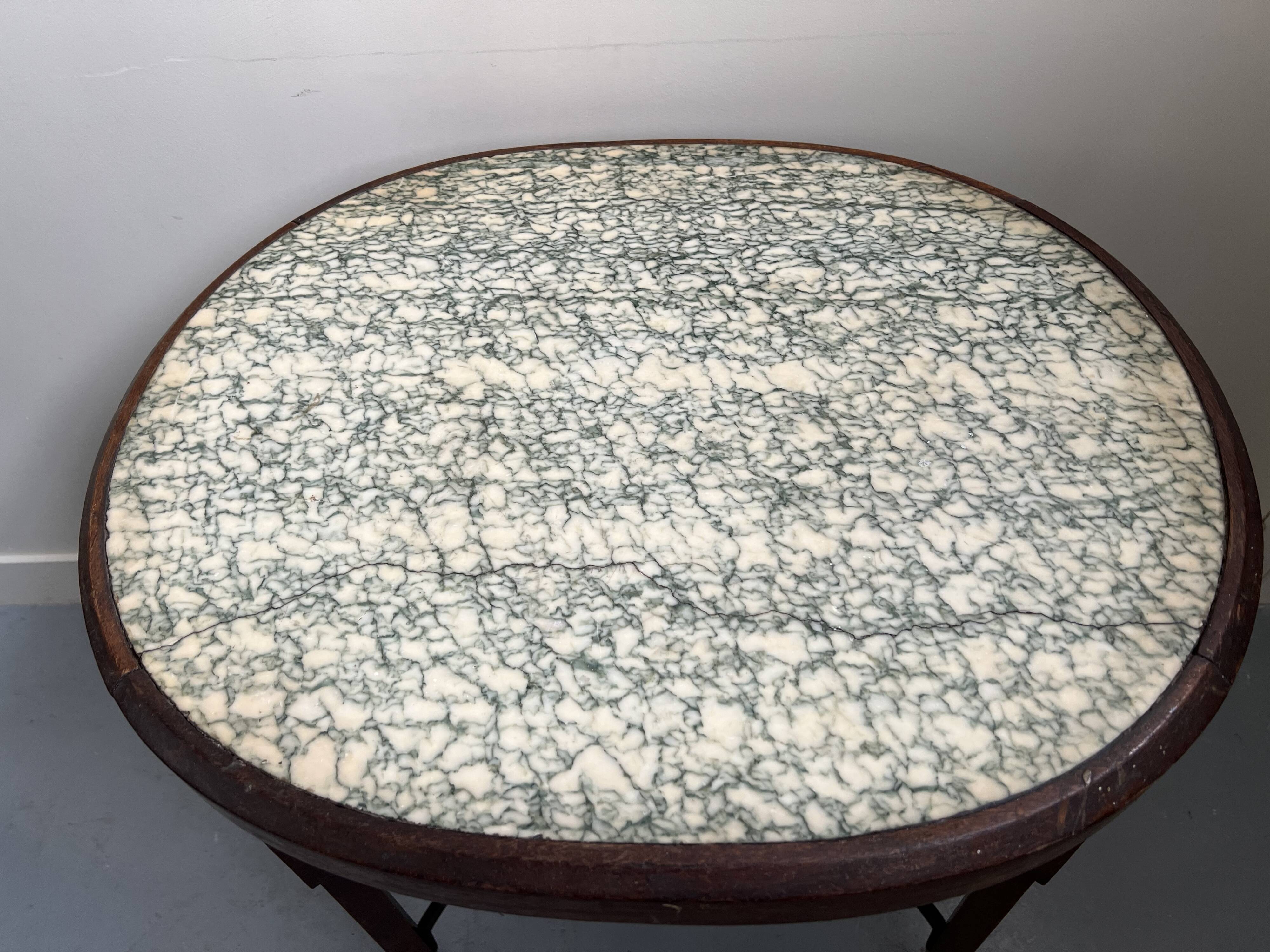 Art Nouveau oval table with marble top, late 19th century