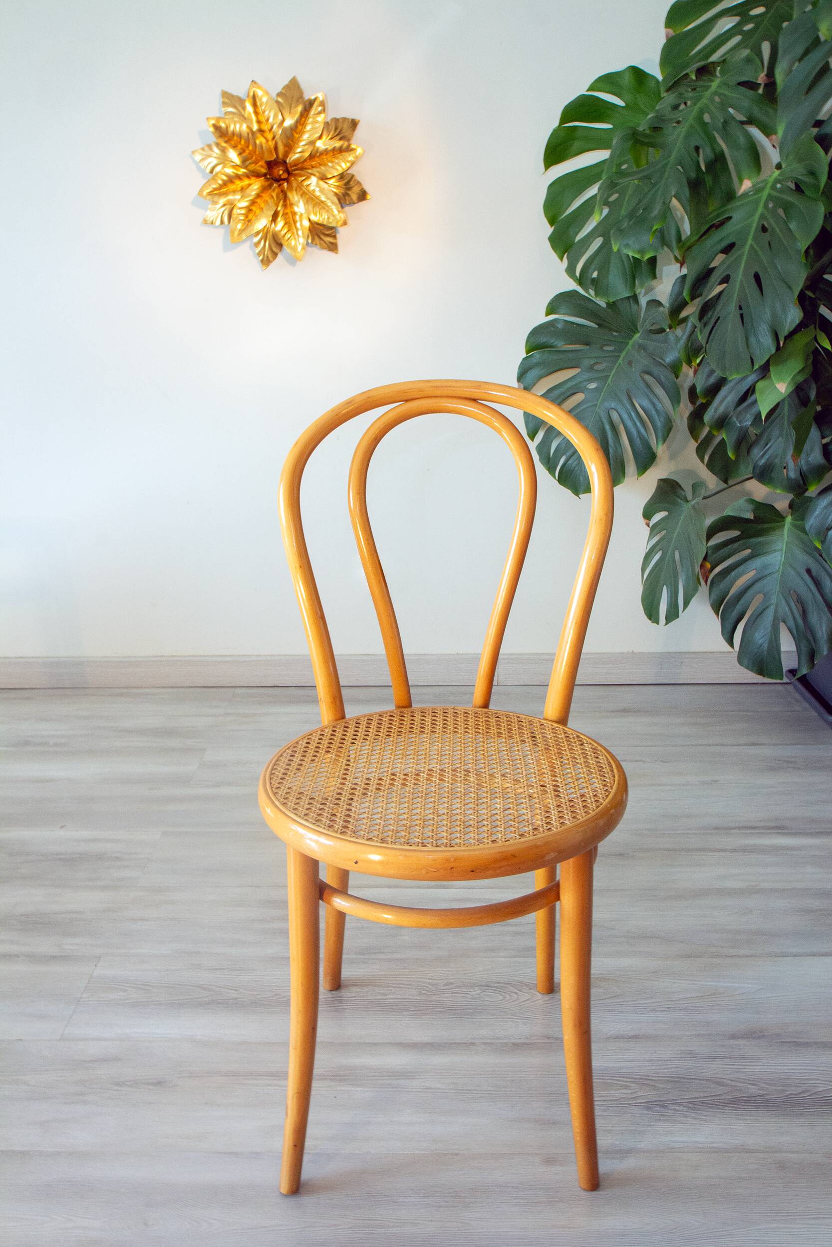 Pair of 1970s bistro chairs in bentwood and caning.