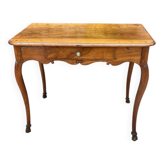 Louis XV period walnut game table French work from the 18th century