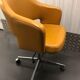 Vintage office chair in mustard yellow skai circa 1960