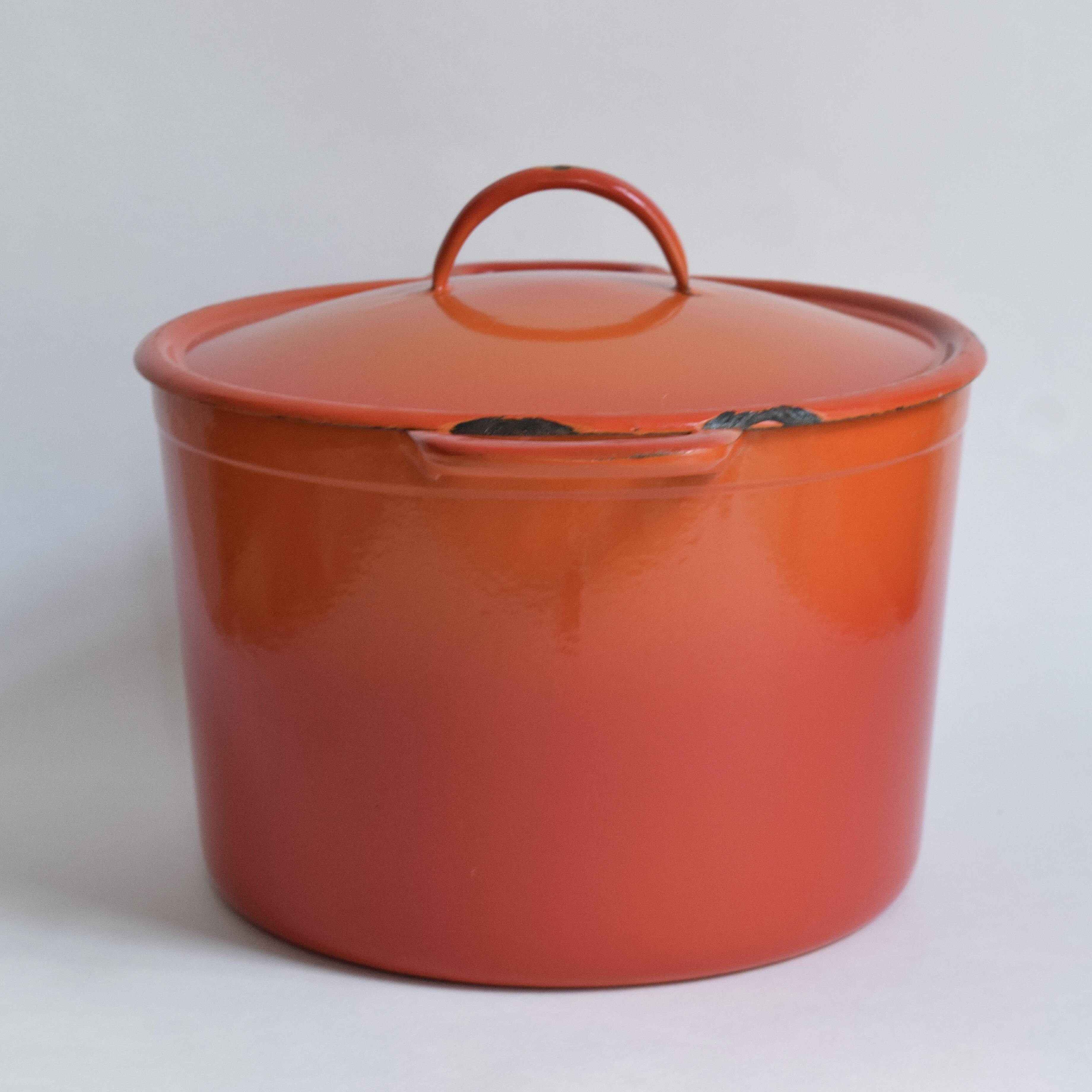 Large vintage saucepan or casserole dish in orange enameled cast iron