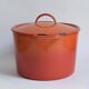 Large vintage saucepan or casserole dish in orange enameled cast iron